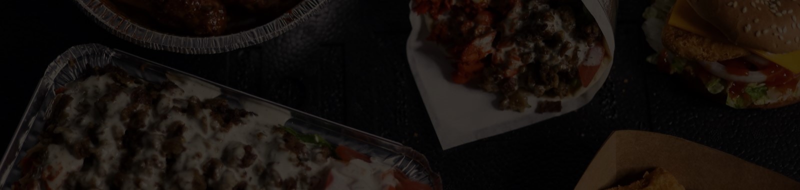 Faded image of Platter, Lamb Gyro and Chicken Sandwich